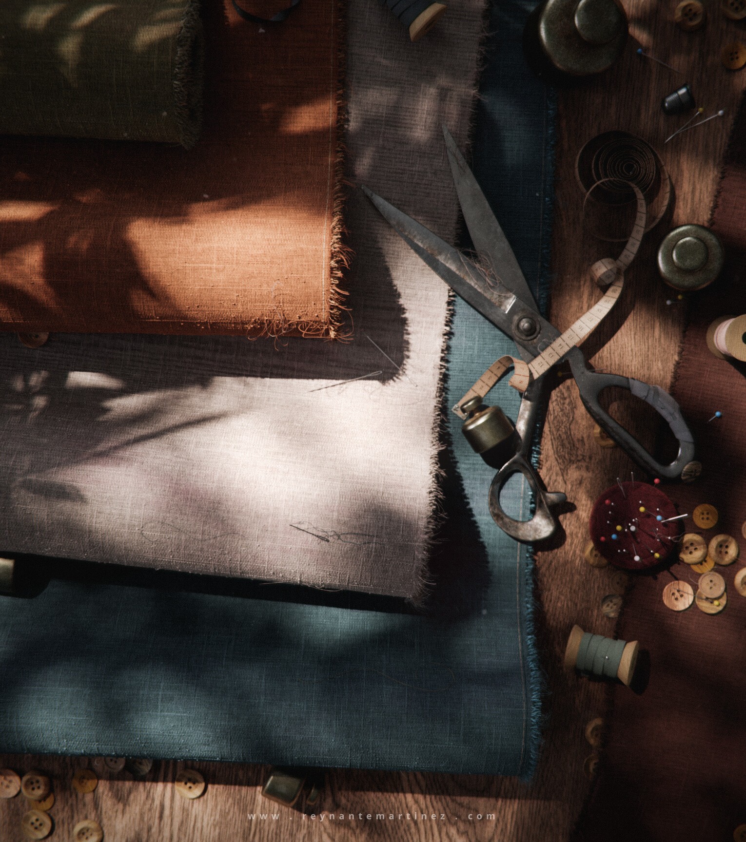 Moments: an overhead still life of layered fabrics, scissors, buttons, thread, and sewing tools under warm light.